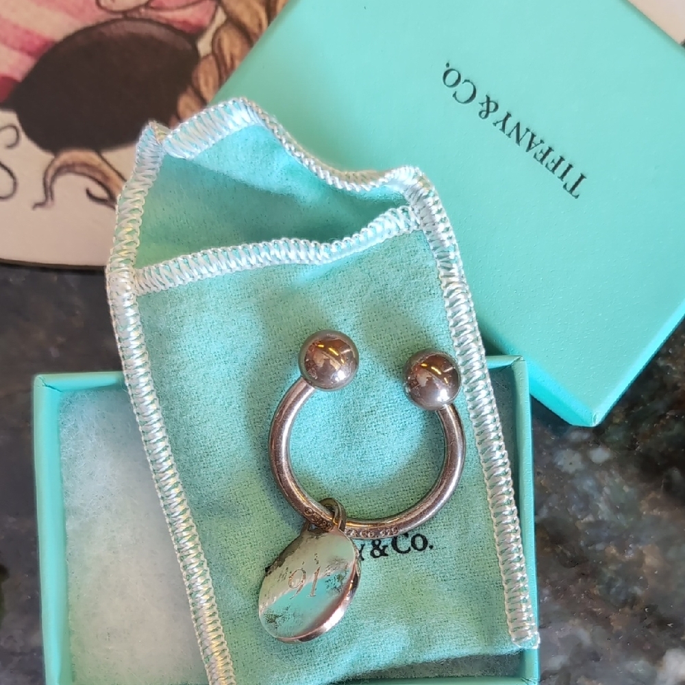 Tiffany & Co. Silver Ring with Blue Charm